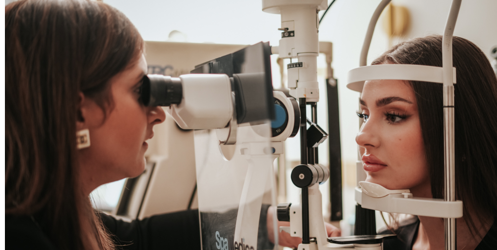 Female patient at Edwards & Walker Opticians in Doncaster have her eyes tested by Dr Pretty Basra.